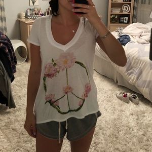 Never worn before. Chaser T-shirt.